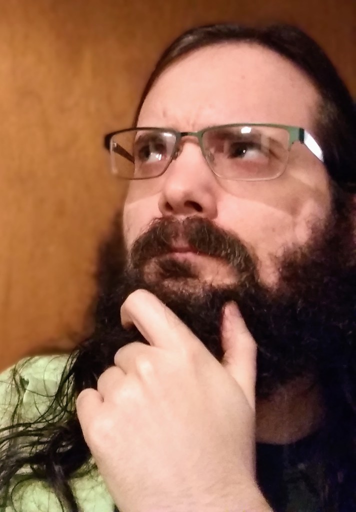 A selfie of me looking pensively off to the side.