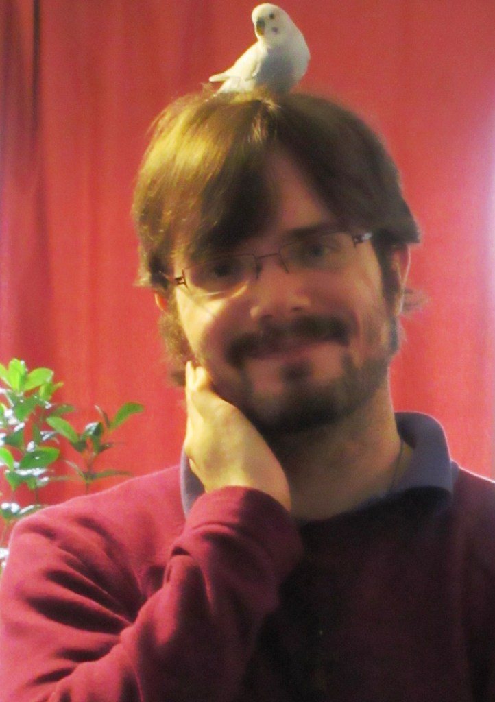 Me with a bird on my head.