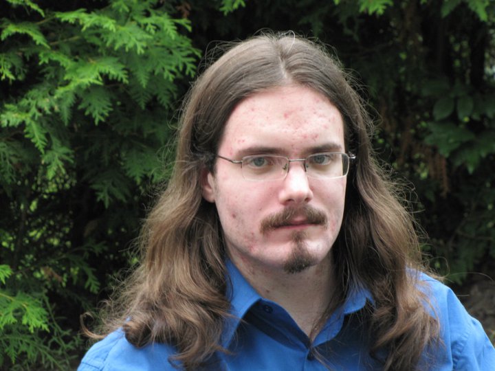 A headshot of Joel Balkovec.