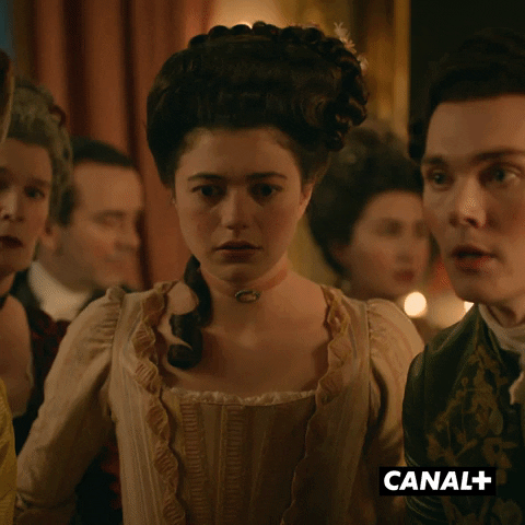 A scene of a woman in a period drama fainting.