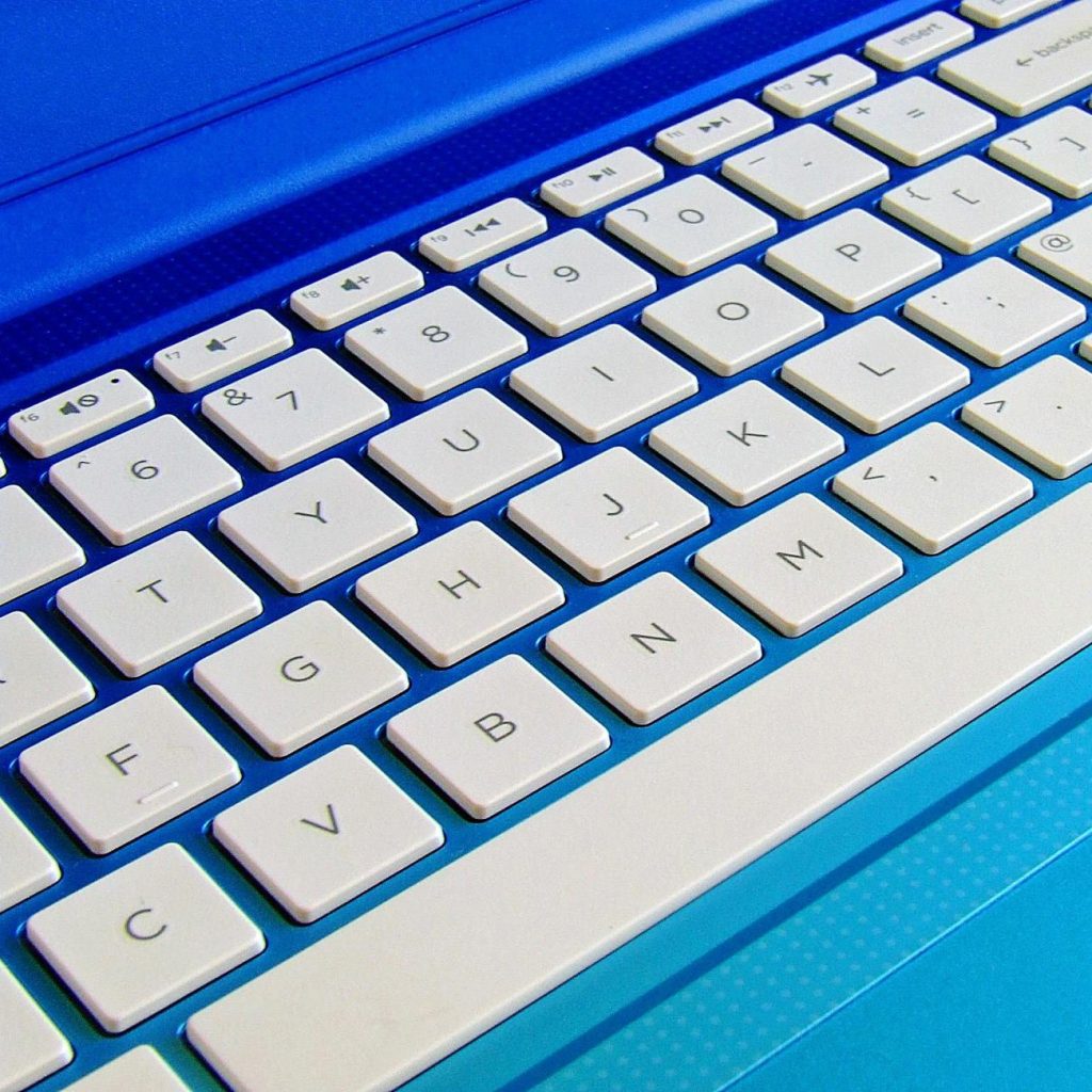A blue and white computer keyboard.
