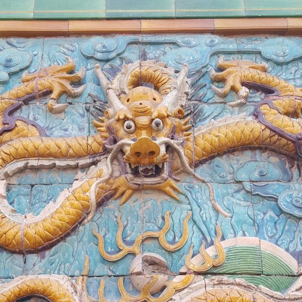 Asian stonework depicting a dragon.
