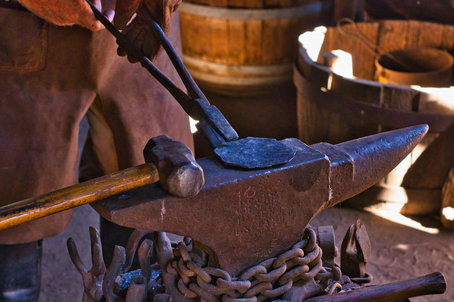 A blacksmith's forge, focusing on the anvil.