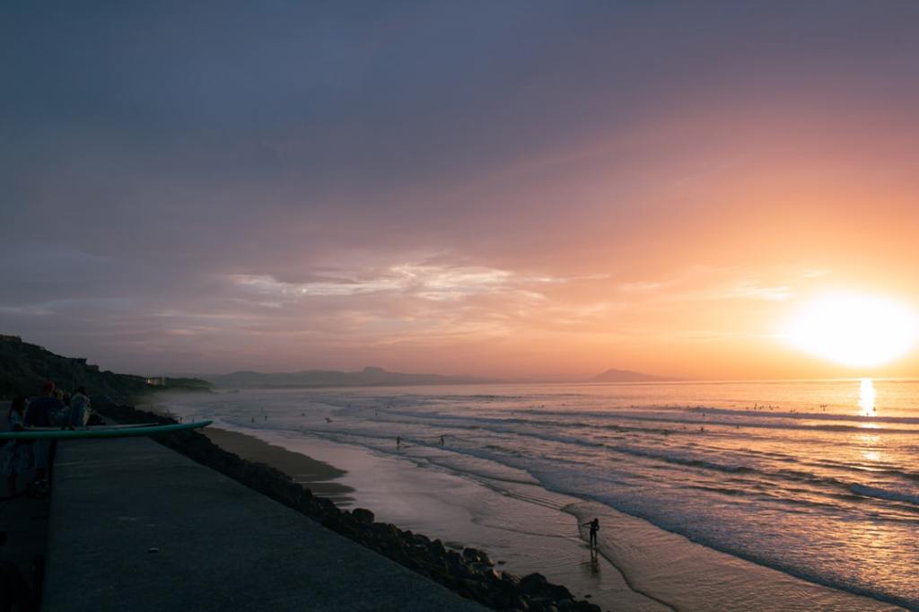 A beach at sunset.