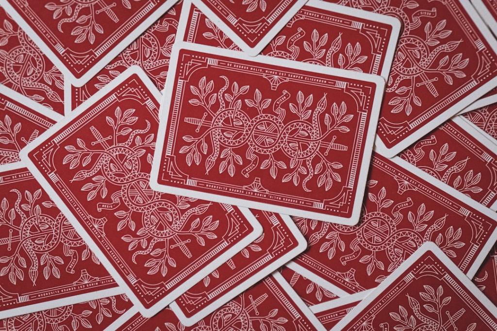 Playing cards scattered around a table.