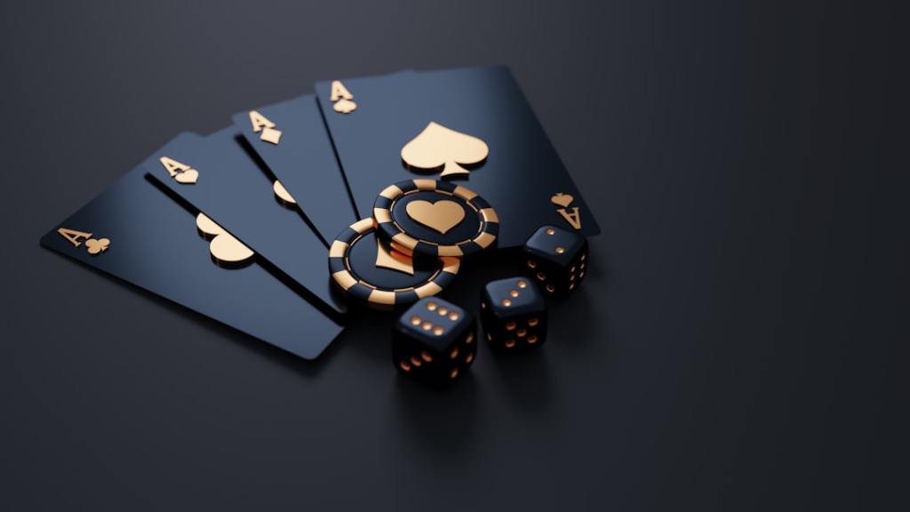 Black and gold cards, chips, and dice.