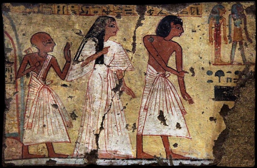 An Ancient Egyptian wall painting depicting a man, woman, and priest.