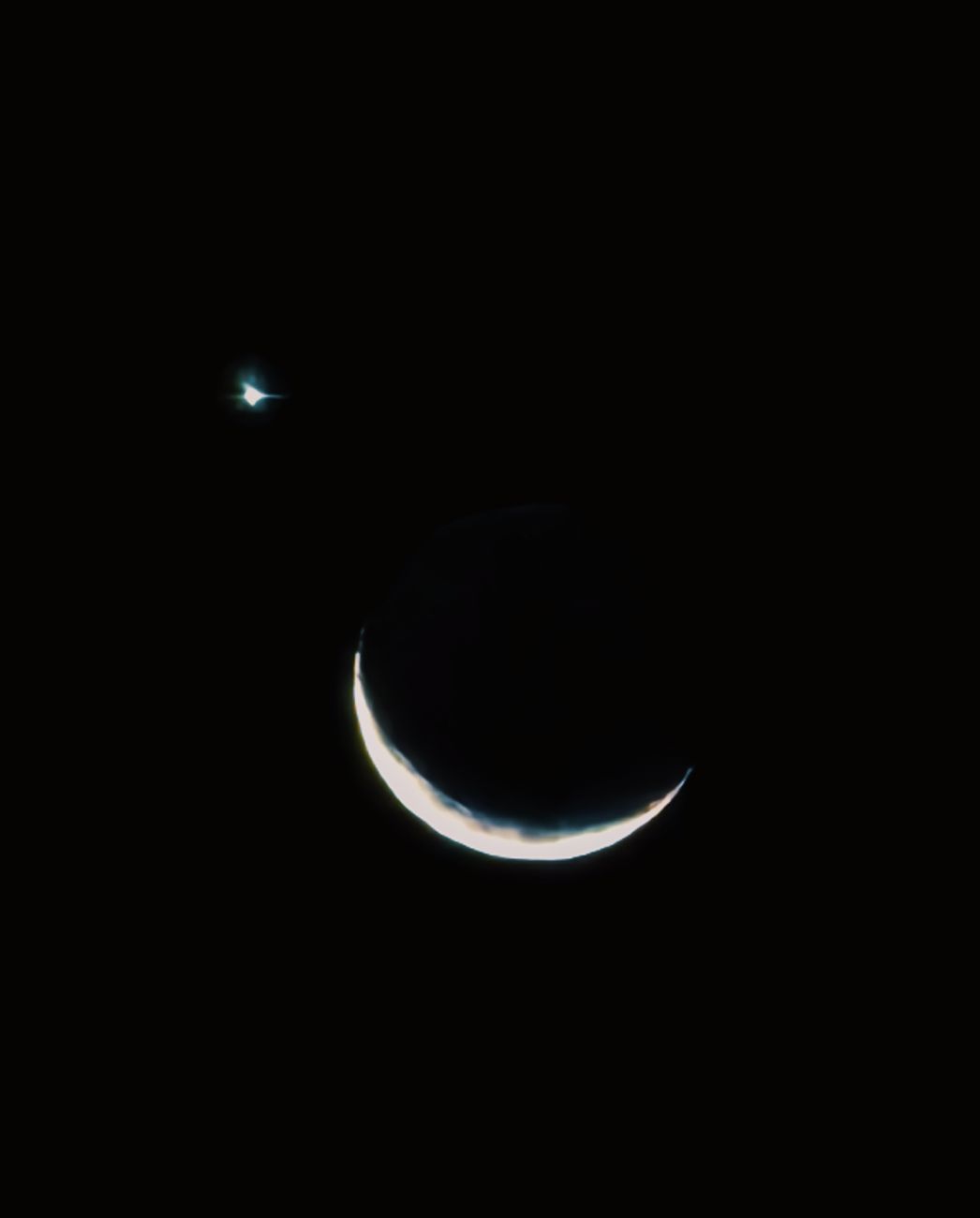 Venus and a crescent moon.